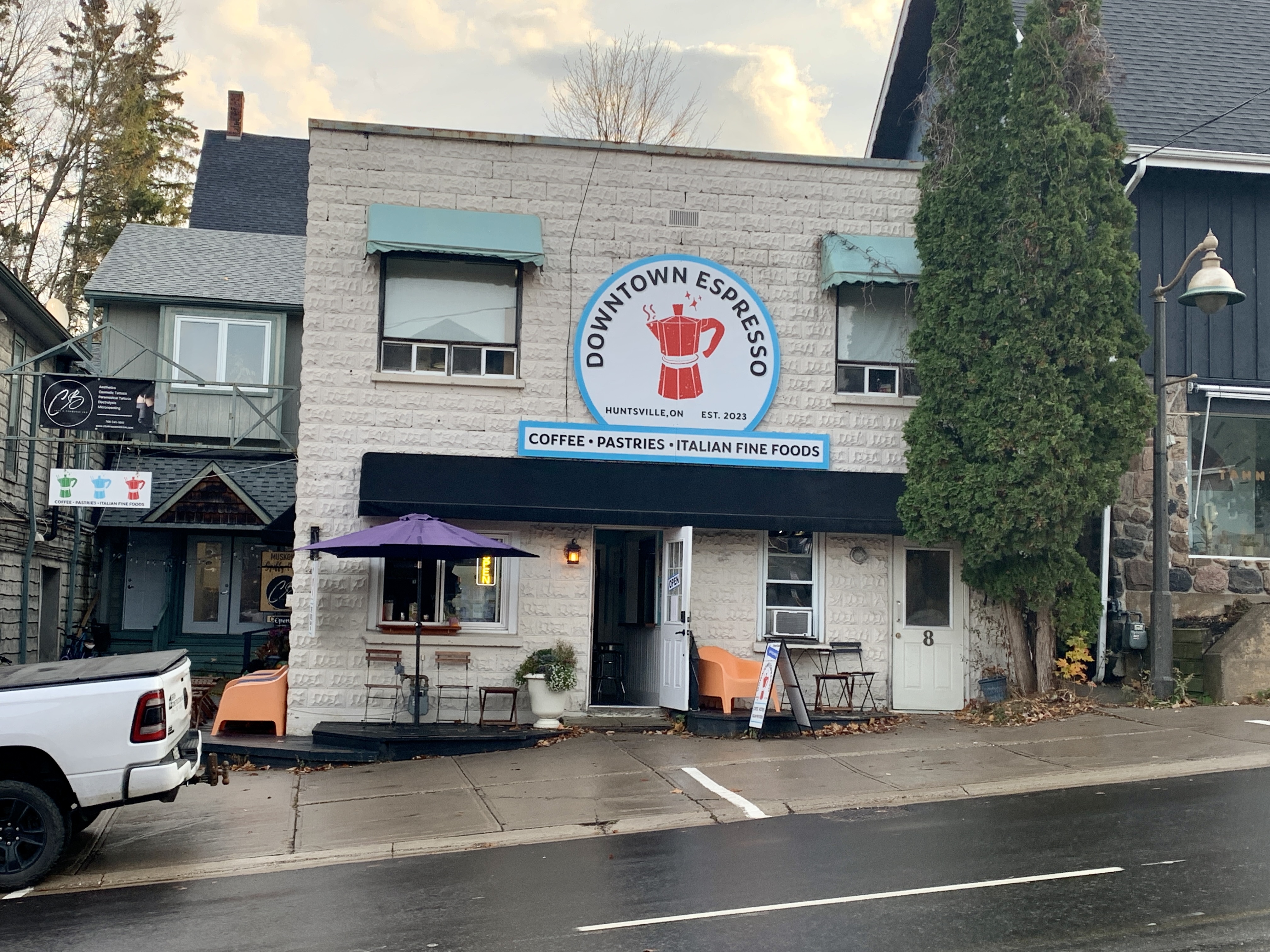 The outside of Downtown Espresso, an Italian style cafe with a simple coffee and pastry selection.