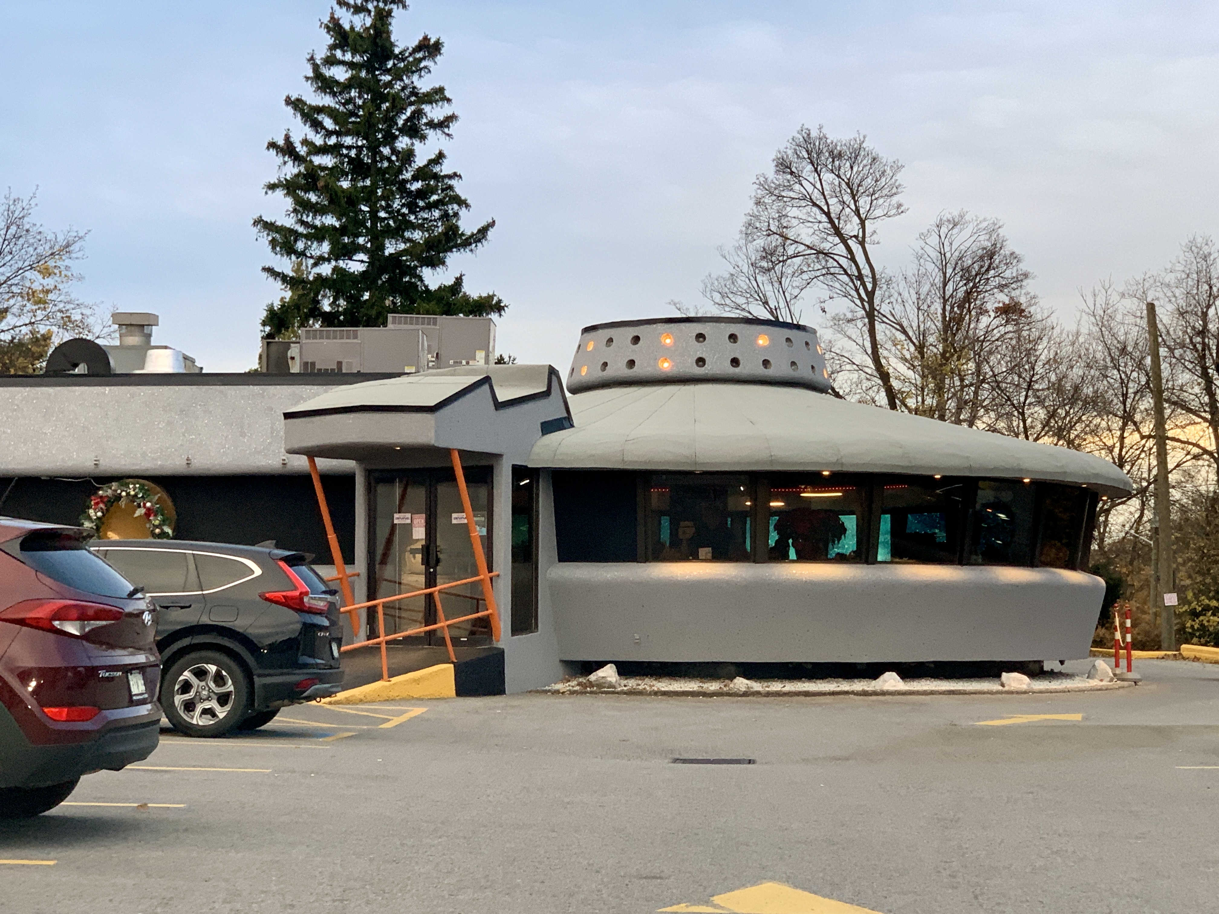 The outside of the Flying Saucer is shaped like a flying saucer UFO of the 1970s.