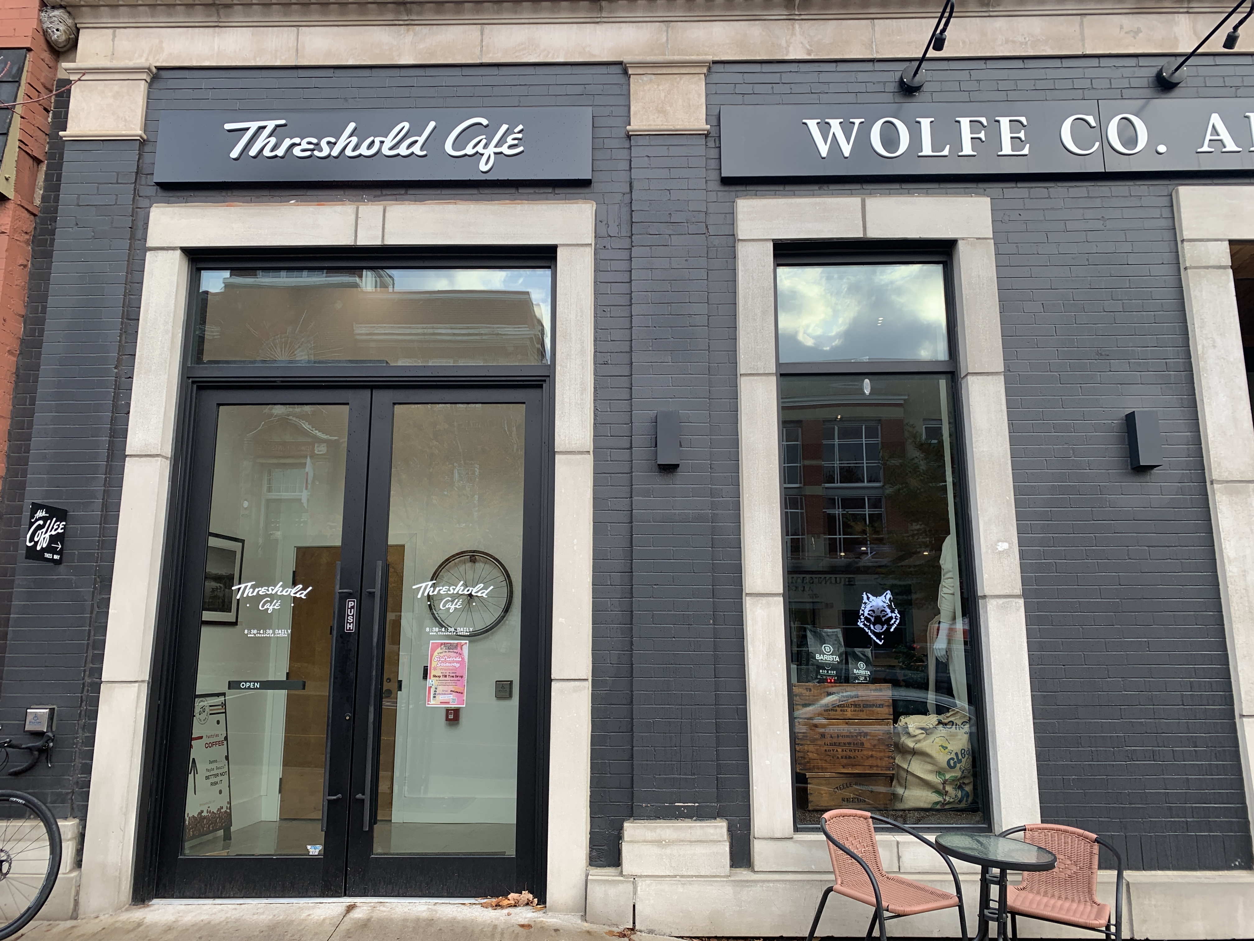 The outside of Threshold Café connected to Wolf Co