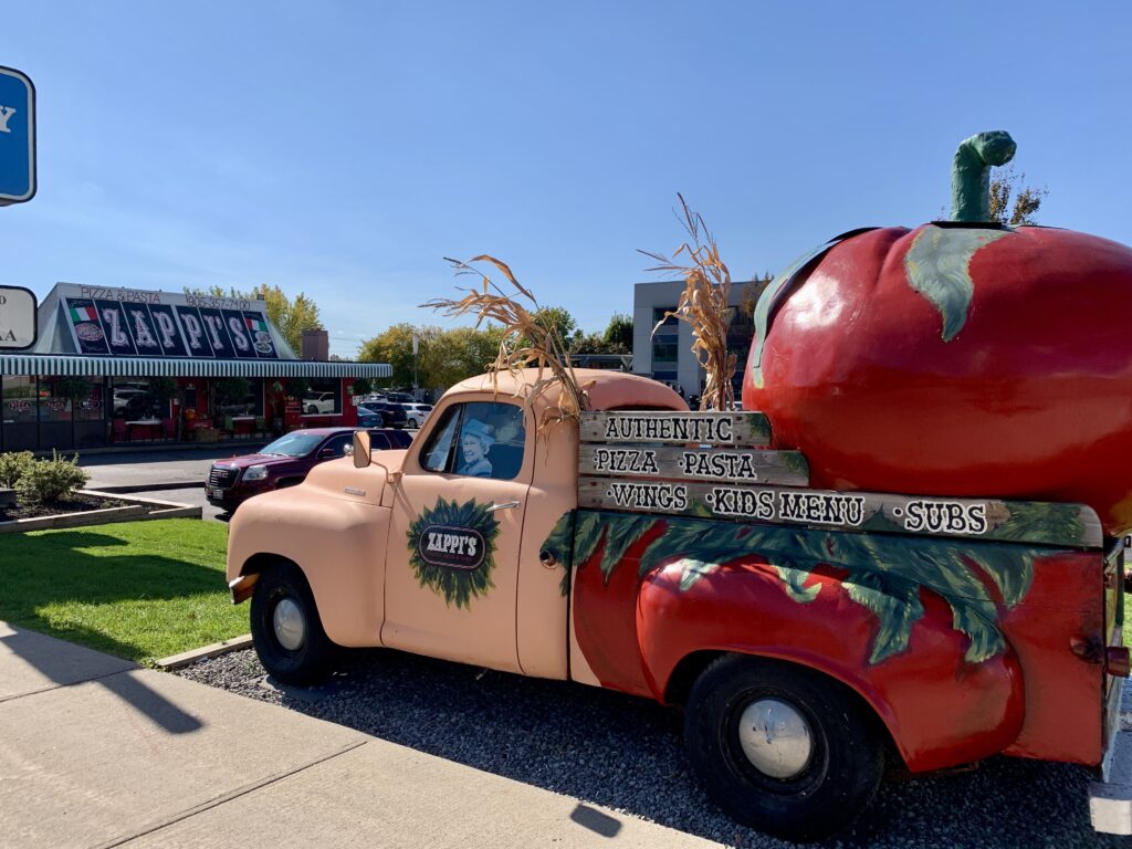 Zappi's Italian restaurant has an old painted truck with a massive fake tomato in the back used as advertisement.