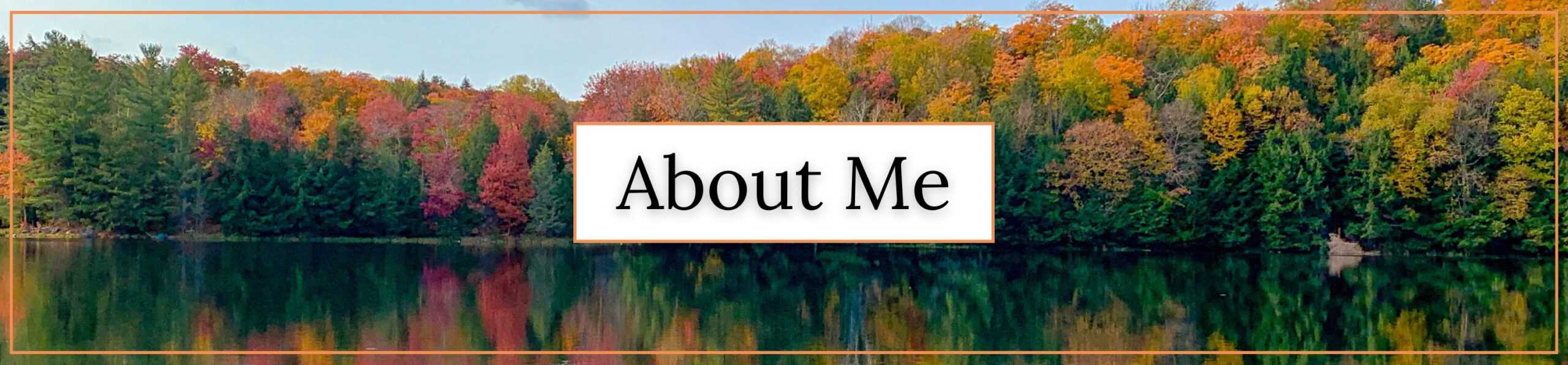 Header image of a lake and trees in autumn with overlay text reading "About Me"